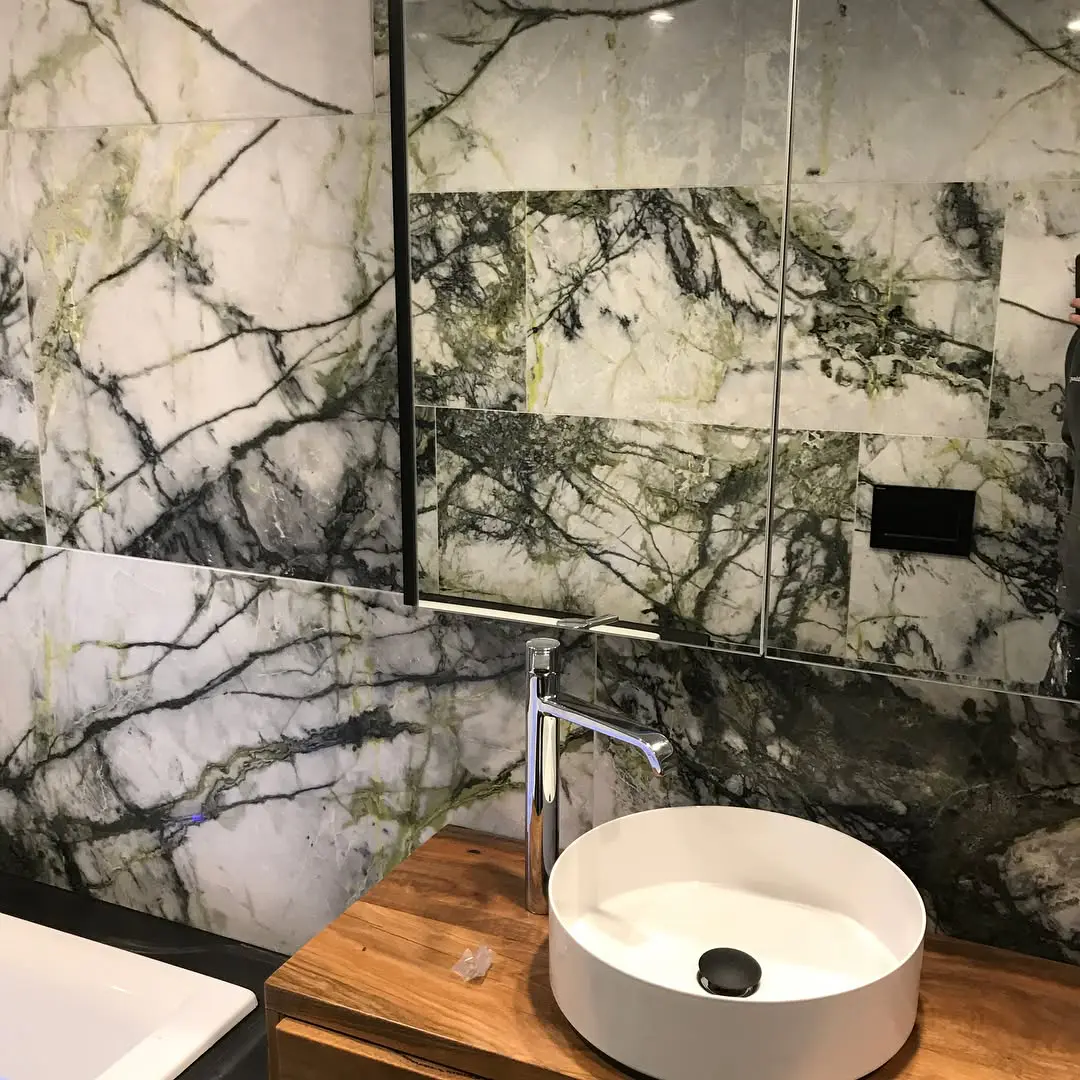Renovated bathroom in a Yarralumla home with a freestanding bath, shower screen and timber vanity