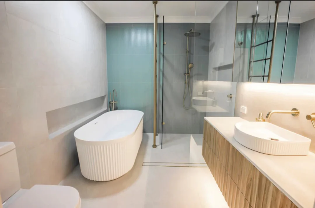 Renovated ensuite with walk-in shower and floating vanity in Canberra home